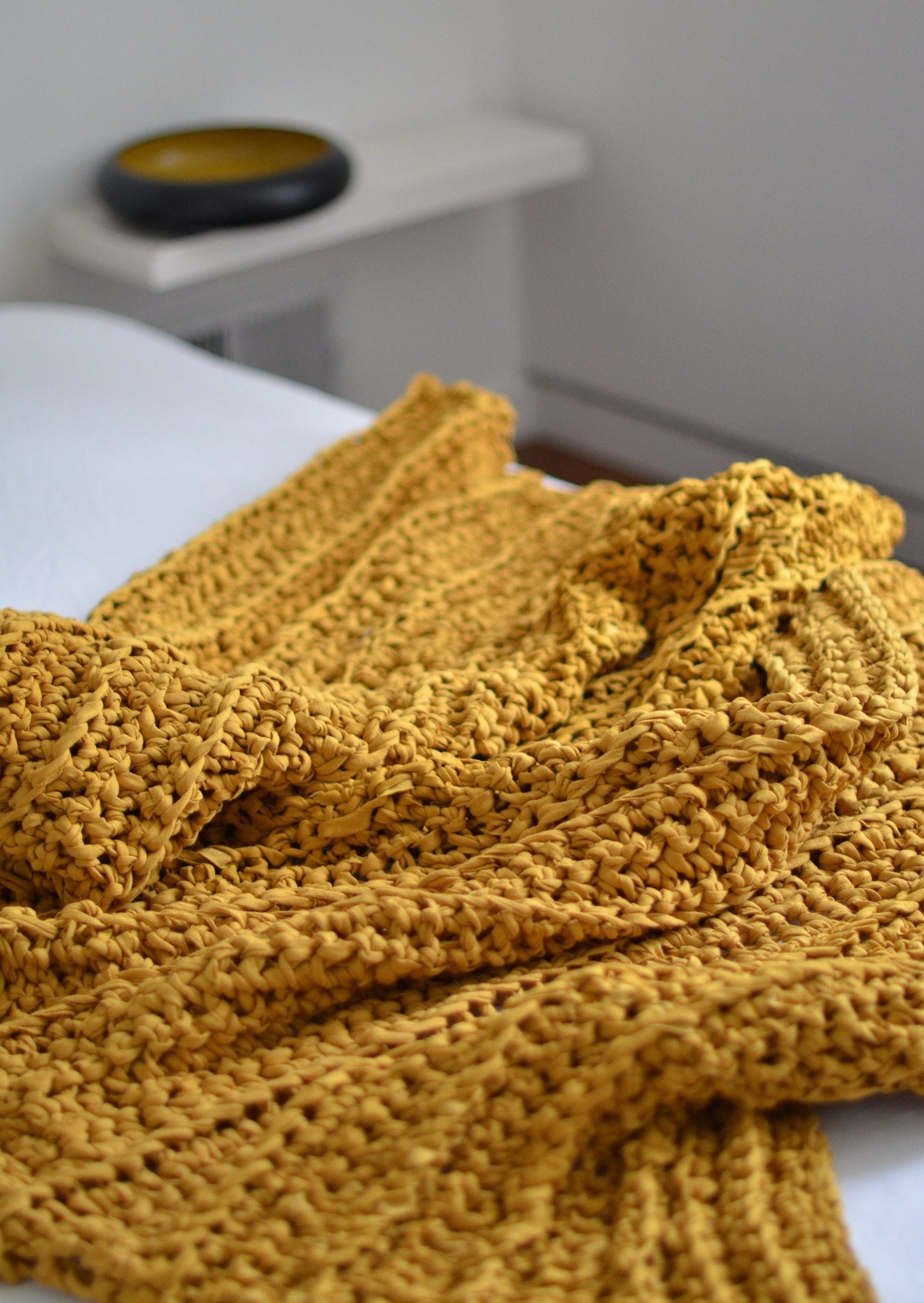 Mustard yellow knitted blanket deals